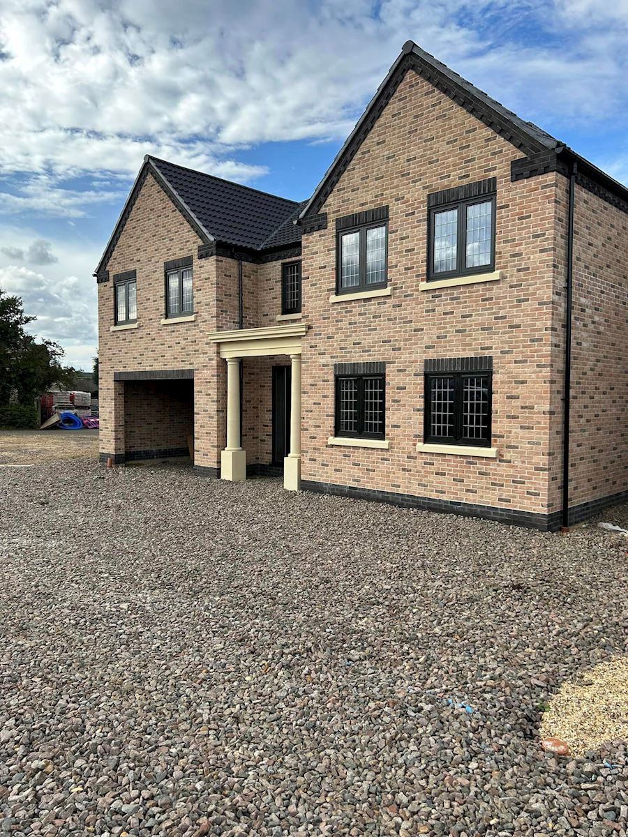 Black Flush UPVC Windows With Square Lead